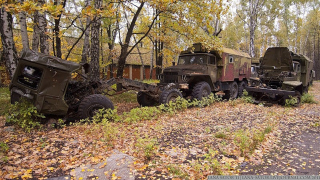 Illustration for article titled Excellent pictures of abandoned Russian military vehicles found in the woods